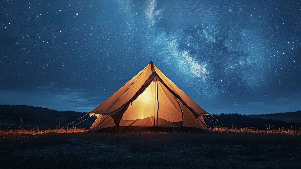 HAVEN solar portable lantern and power bank Inside camping tent against a starry night sky.